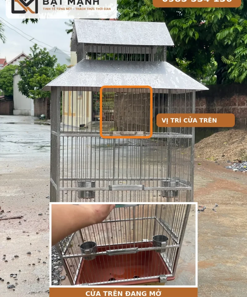 Cửa trên lồng chim inox trên chậu cây đang mở
